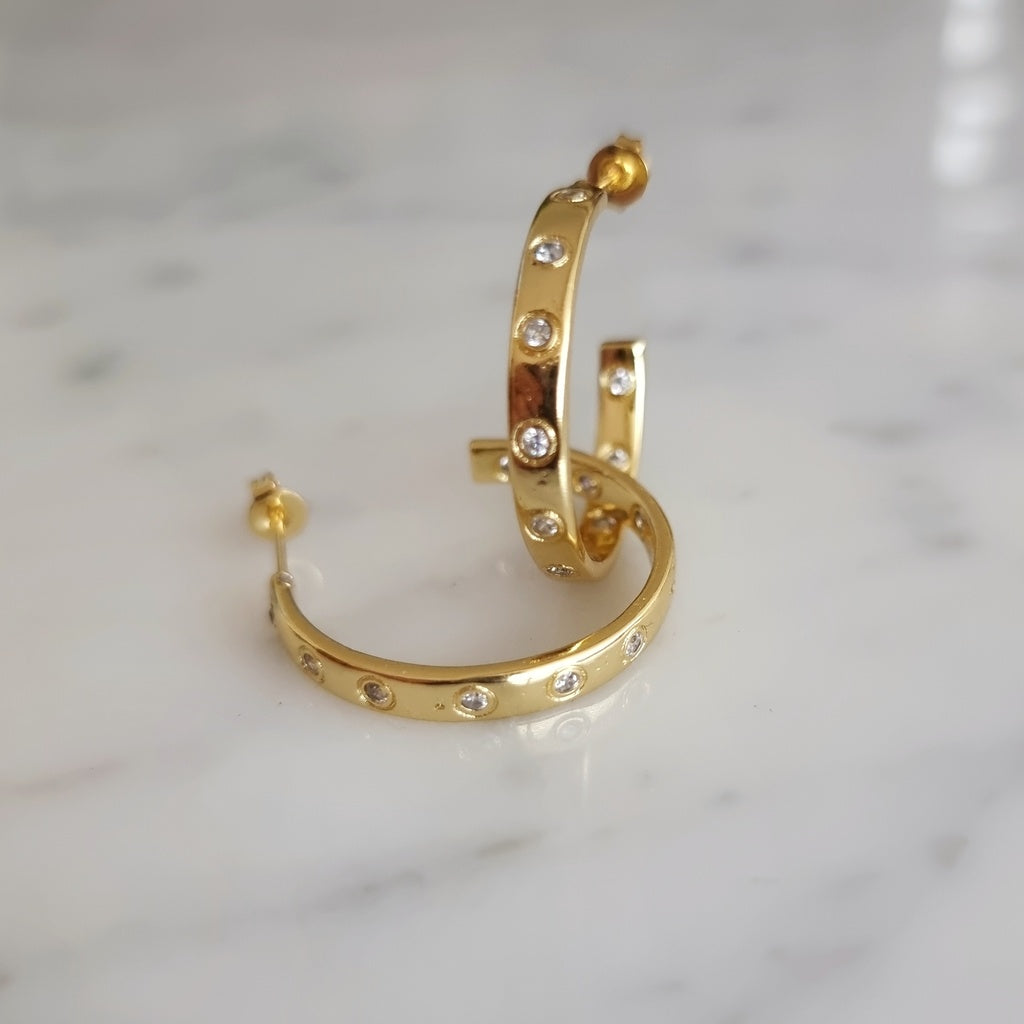 ARGOLLAS CON DESTELLOS - Magnolia Joyas