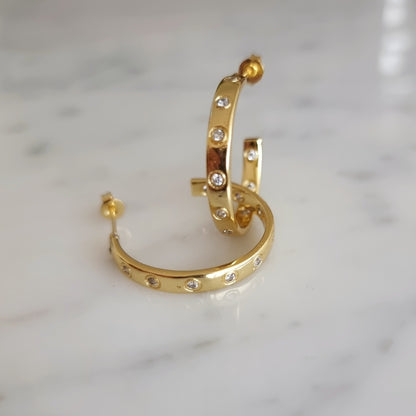 ARGOLLAS CON DESTELLOS - Magnolia Joyas